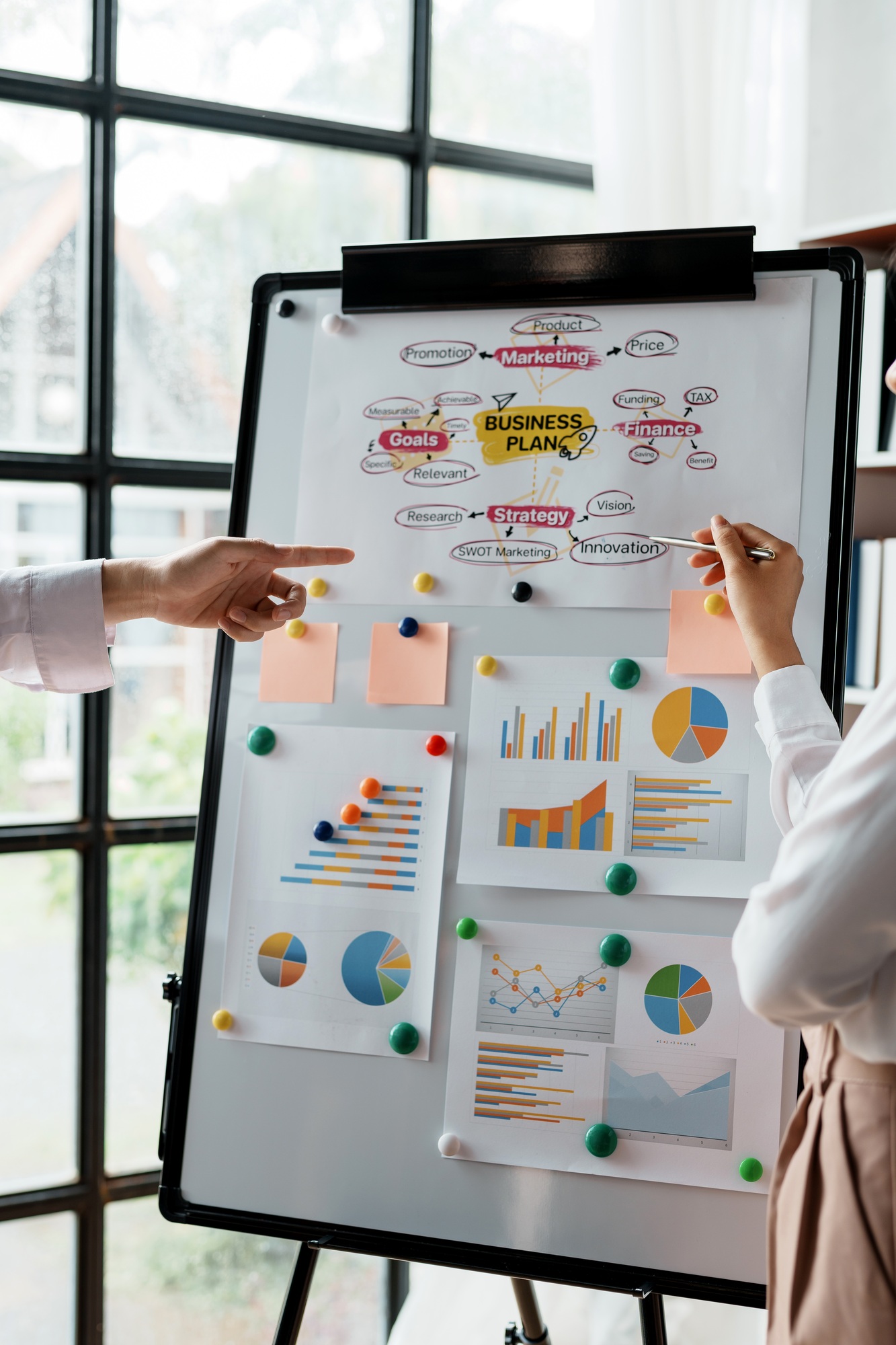 Group of Business people meeting creative planning and development strategy using graphs, charts, pr